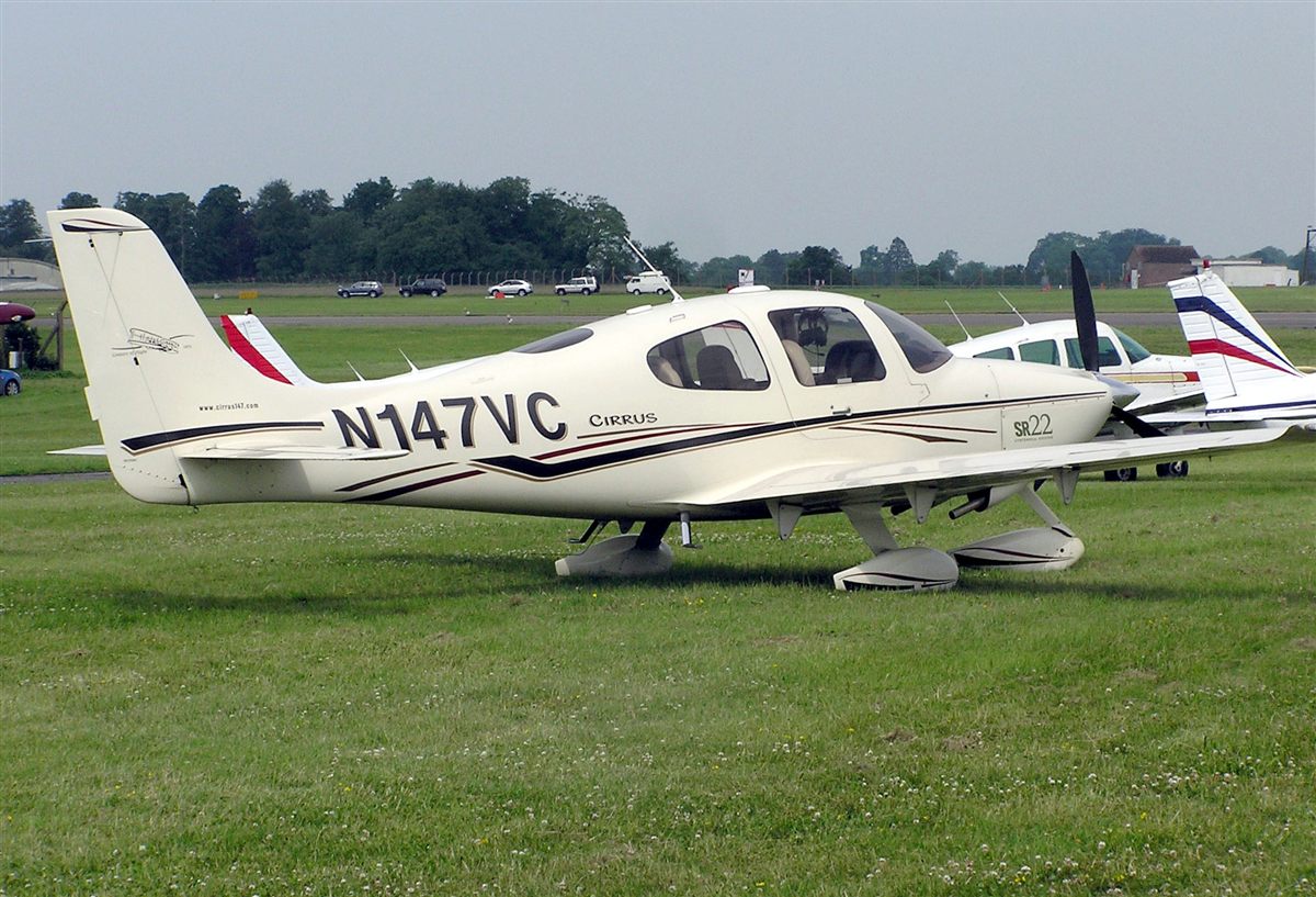 Cirrus SR22 parked on grass